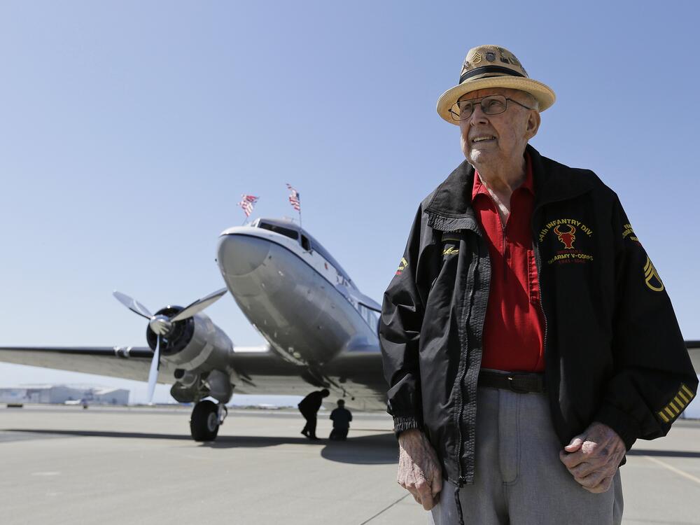 In this photo taken April 29, 2019, D-Day veteran Jake Larson poses before going for a ride in the 