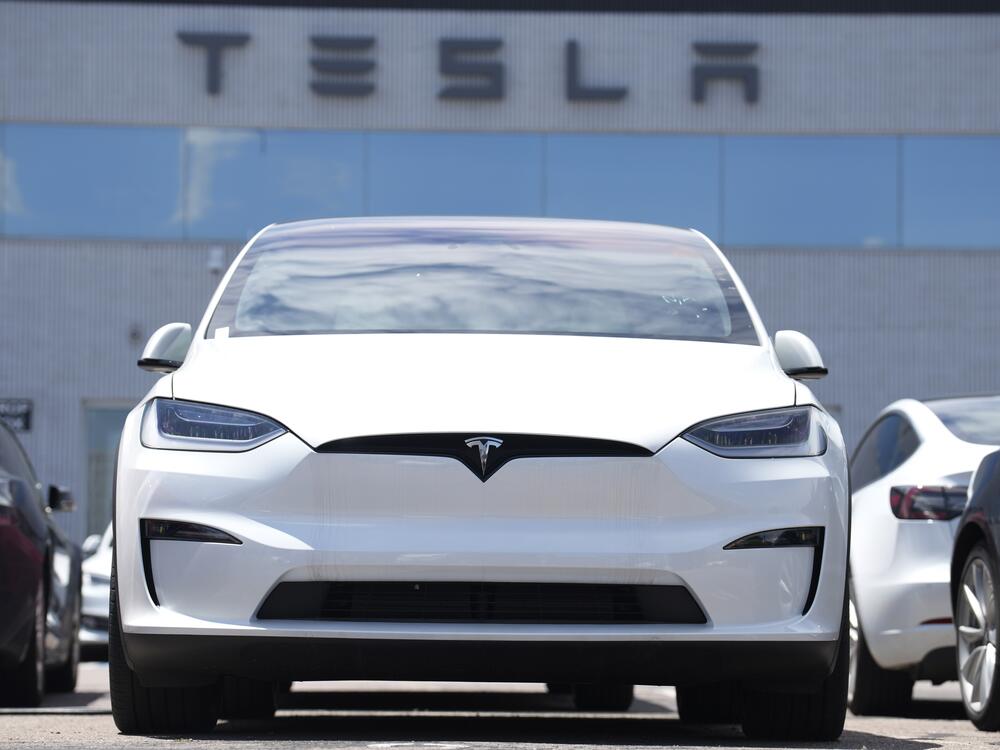 A 2023 Model X sports-utility vehicle sits outside a Tesla dealership Sunday, June 18, 2023, in Englewood, Colo.