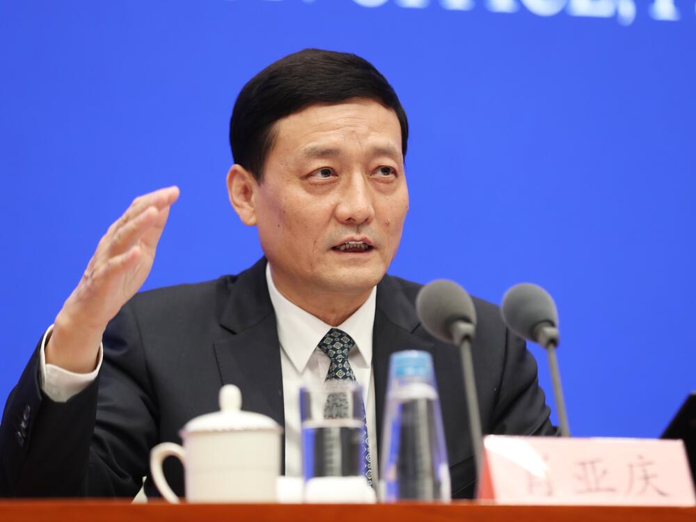 China's then-industry minister, Xiao Yaqing, attends a news conference of the State Council Information Office on March 1, 2021, in Beijing.