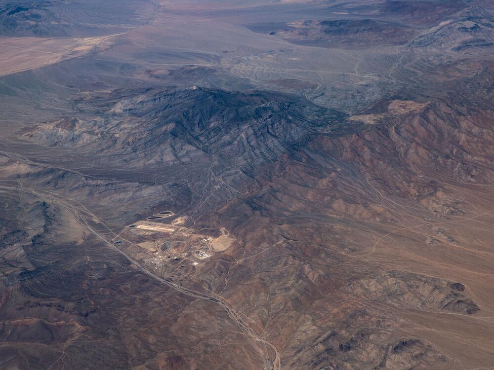 The Mountain Pass rare earth mine and processing facility, owned by MP Materials, is viewed from an airplane flying at 37,000 feet on Sept. 1, 2023, in Mountain Pass, Calif.