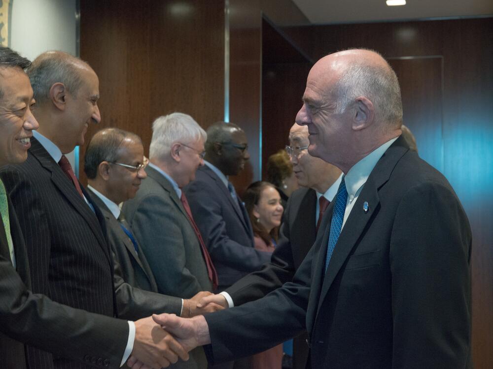 David Nabarro (front right) greets other members of the Secretary-General's corps of special advisers in 2016.