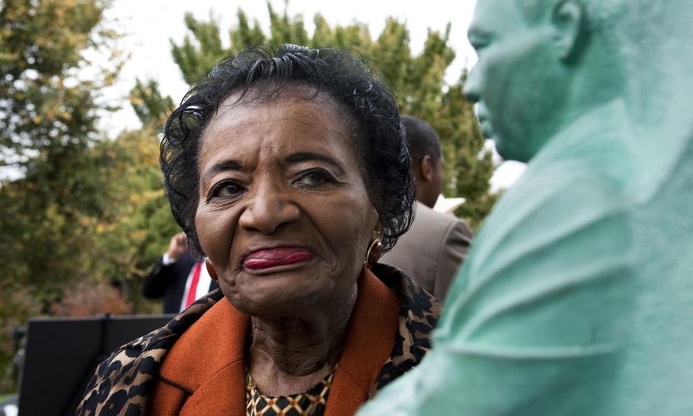 Christine Farris, the sister of Martin Luther King, Jr., passes a statue of her brother after a news conference announcing that work will commence on the site of the proposed Martin Luther King Jr. Memorial in Washington, D.C., Oct. 29, 2009. File photo by Joshua Roberts/REUTERS