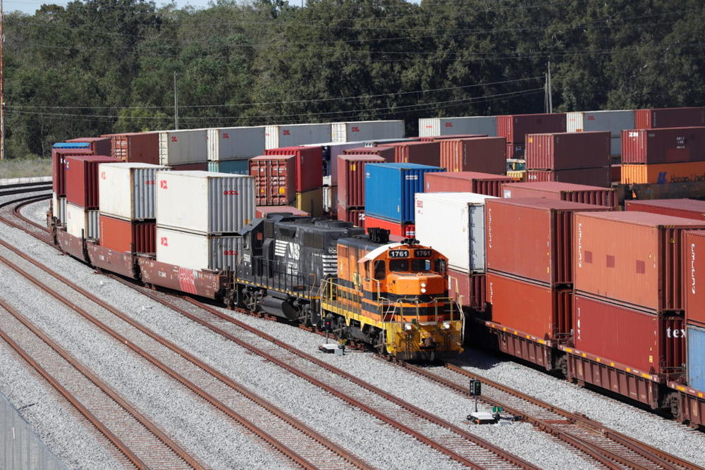 A commercial freight train carries a load of shipping containers at the Port of Savannah, Georgia, U.S. October 17, 2021. Photo by Octavio Jones/REUTERS