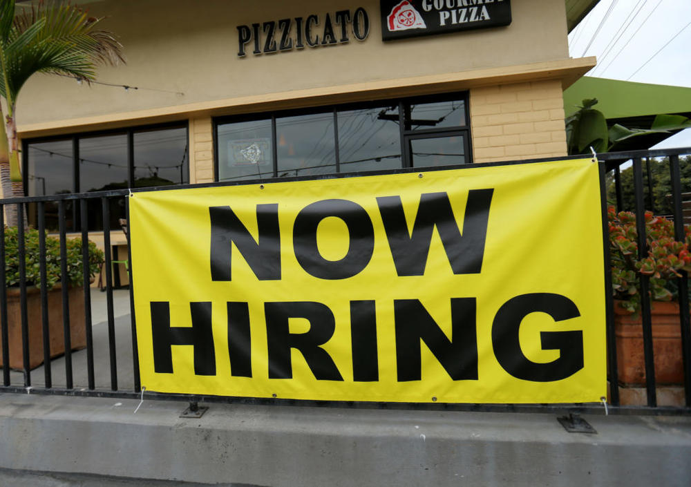 A local pizza restaurant advertises for workers in Encinitas, California, U.S., September 13, 2016. REUTERS/Mike Blake