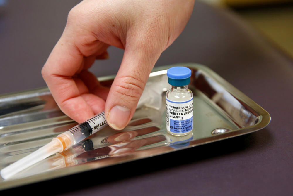 A vial of the measles, mumps, and rubella virus (MMR) vaccine is pictured at the International Community Health Services clinic in Seattle, Washington, U.S., March 20, 2019. Picture taken March 20, 2019. REUTERS/Lindsey Wasson