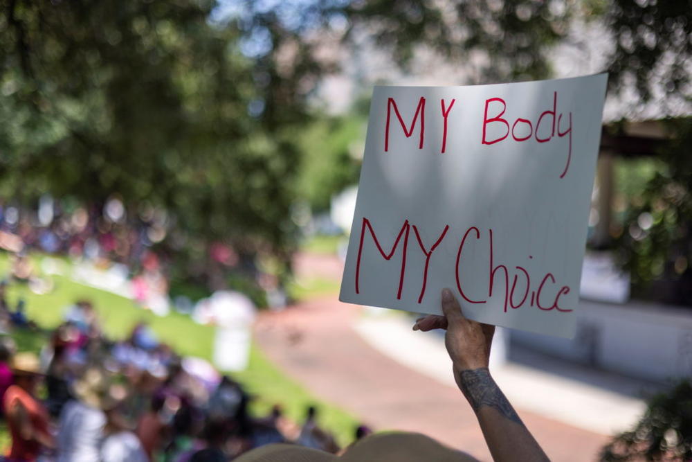 Debbie Jeffreys of Metairie, Louisiana, holds a sign during nationwide demonstrations following the leaked Supreme Court opinion suggesting the possibility of overturning the Roe v. Wade abortion rights decision, at Duncan Plaza in New Orleans, Louisiana, U.S., May 14, 2022. Photo by Kathleen Flynn/REUTERS