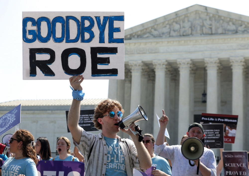 Anti-abortion activists demonstrate outside the Supreme Court of the United States in Washington, U.S., June 13, 2022. REUTERS/Evelyn Hockstein