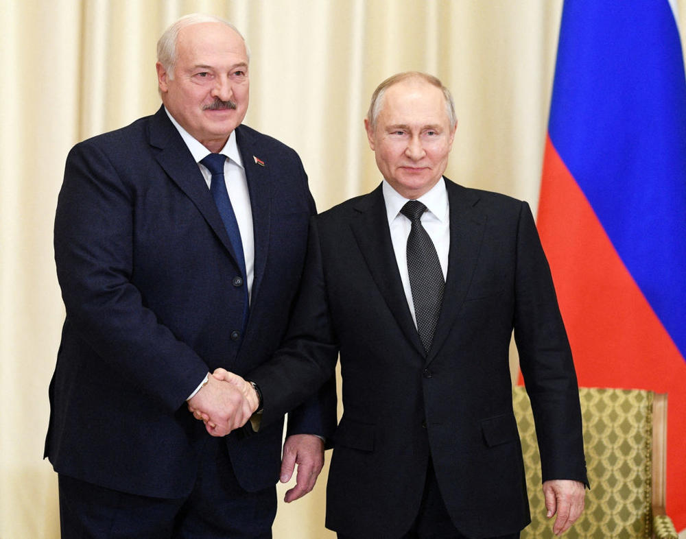 FILE PHOTO: Russian President Vladimir Putin shakes hands with Belarusian President Alexander Lukashenko during a meeting at the Novo-Ogaryovo state residence outside Moscow, Russia, Feb. 17, 2023. Photo by Vladimir Astapkovich/Sputnik/Kremlin via REUTERS