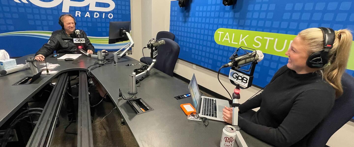 Hosts Jon Nelson and Hannah Goodin during a taping of the "Football Fridays in Georgia" podcast.