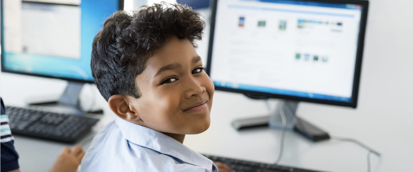 student in front of computer