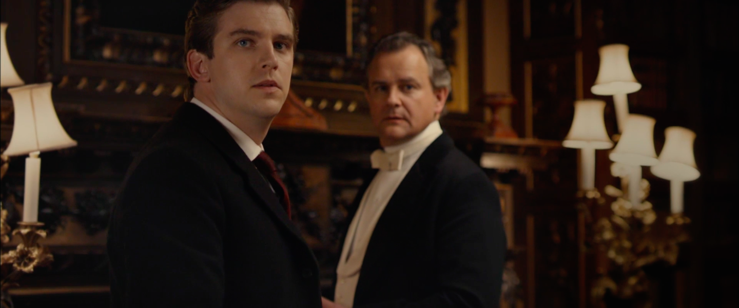 Two men in a study.