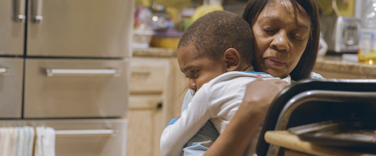 Nunu comforts Noah, from THROUGH THE NIGHT