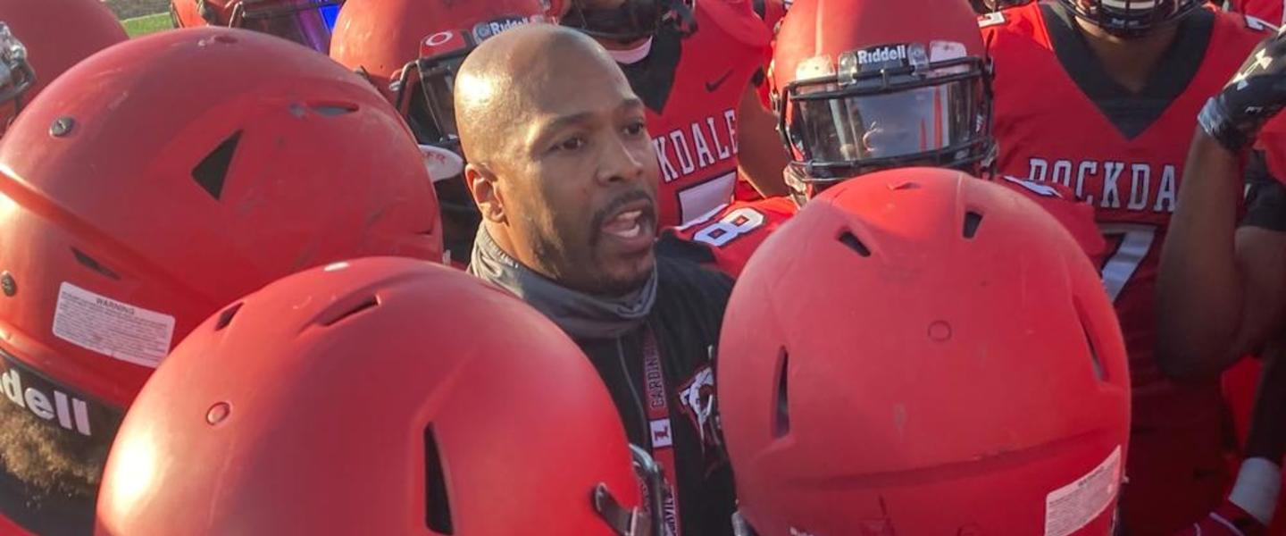 Rockdale County Head Coach Lee Hannah Surrounded By His Players