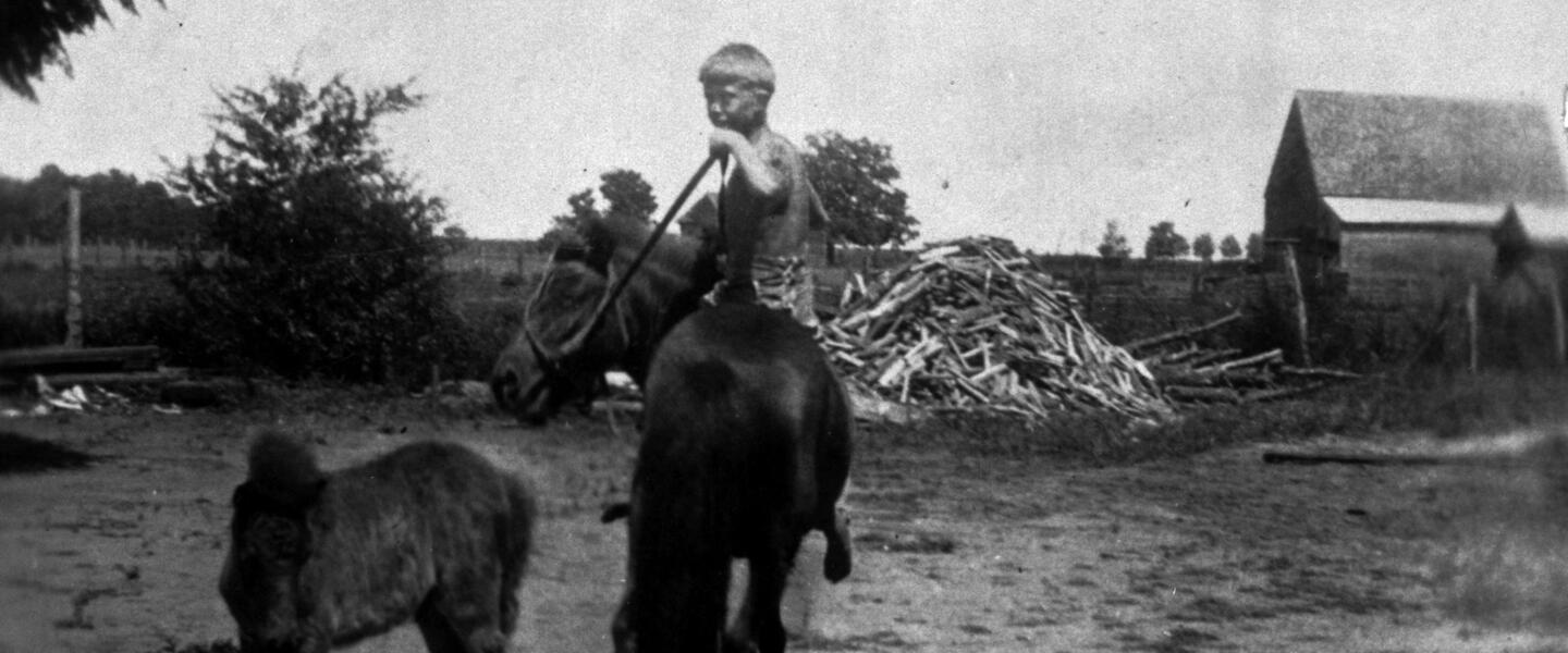 In 1928, the Carter family moved to a 350-acre farm near Plains in the tiny community of Archery, Georgia. The young Carter is pictured here atop his Shetland pony named Lady.