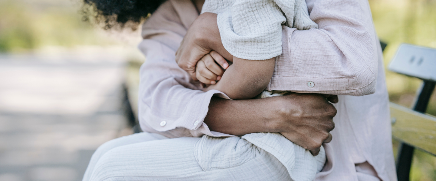 mom hugging child