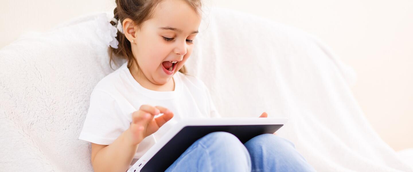 child with tablet