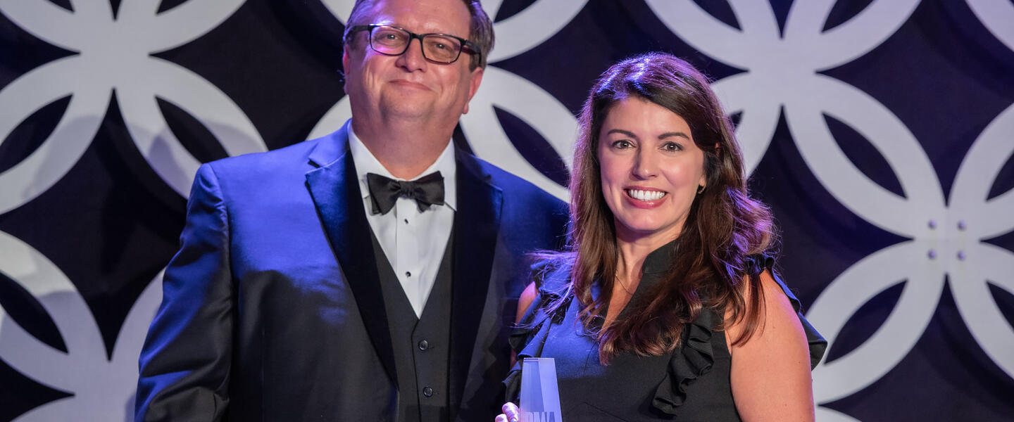 Laura Evans accepts NETA award