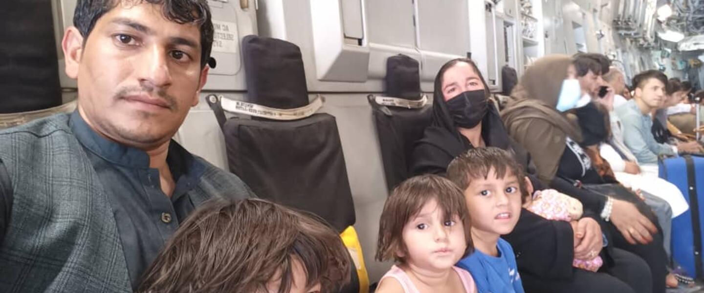 Zak and Family on Air Force plane out of Kabut