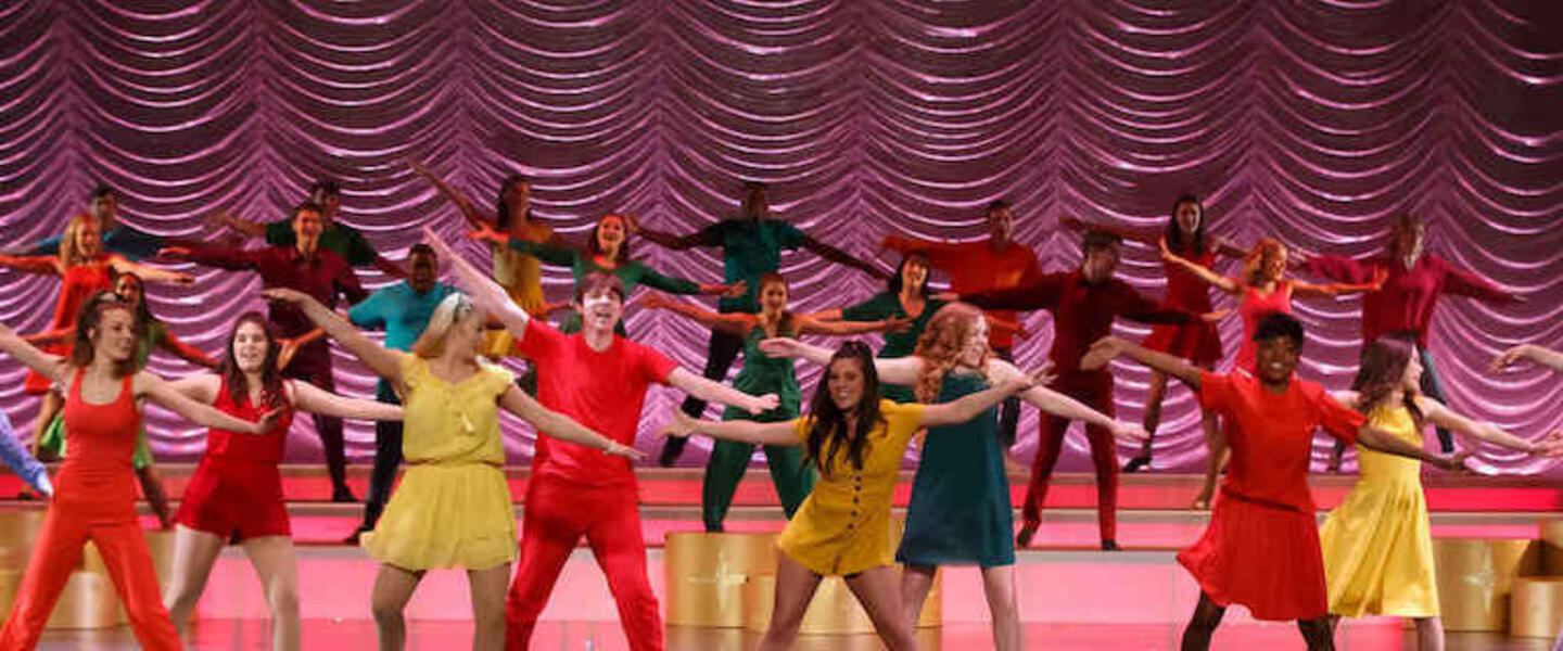 High schoolers performing in a musical.