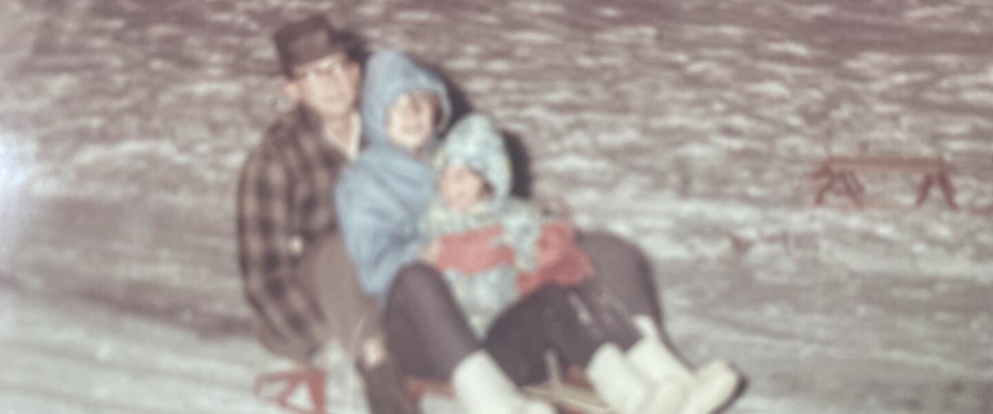 Sharon Collins, 10 - in the center - with her father and sister. "Dad never said 'no' to snow."