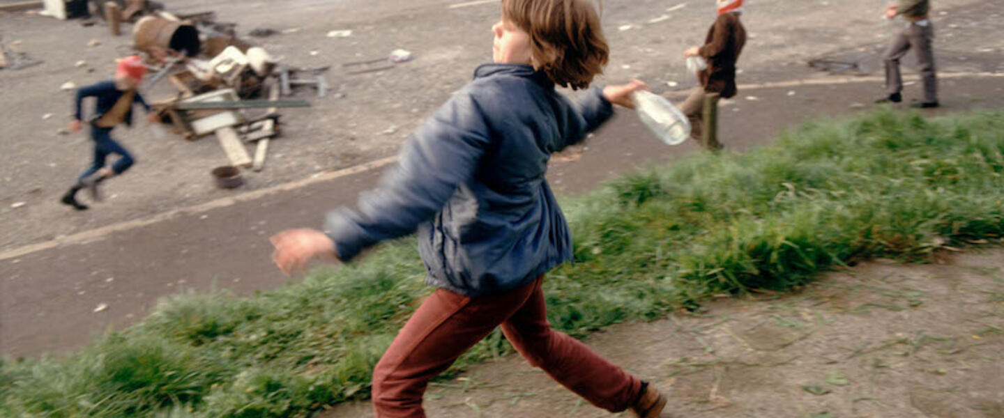Anne Marie, aged 10, throwing bottles at British troops during a riot in Belfast, Northern Ireland, in 1981.