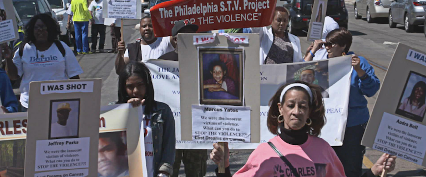 A group of people marching against gun violence.
