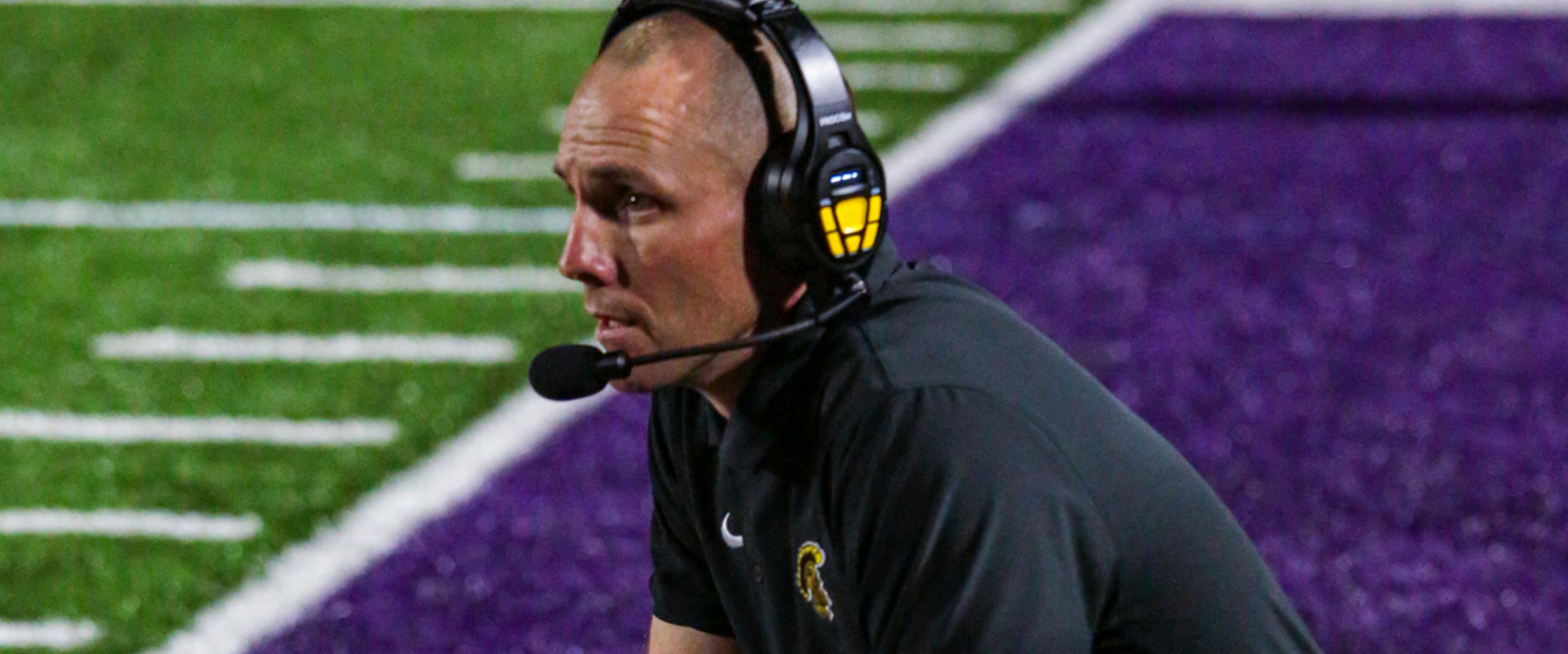 Carrollton head coach Joey King coaching during their game against East Coweta.