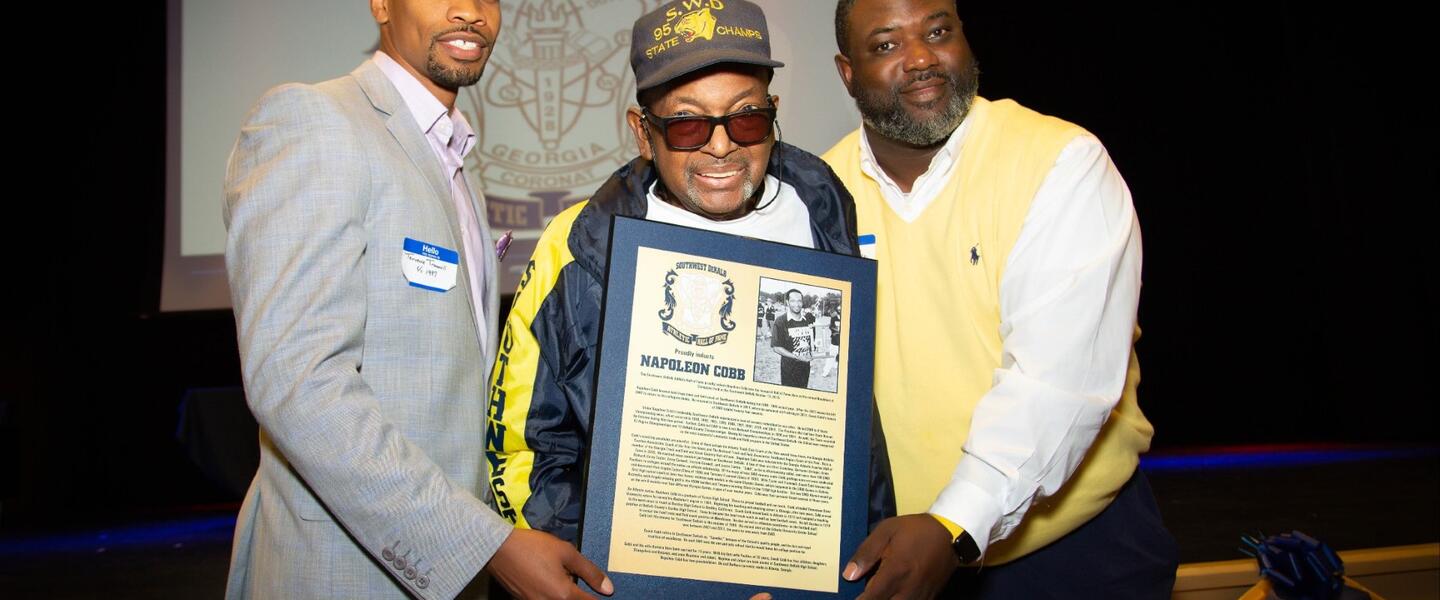 Coach Cobb was inducted into the Georgia Athletic Coaches Association Hall of Fame. Here, he's at his retirement recognition service with Olympic hurdler Terrence Trammell (on left) and Cortez Allen.