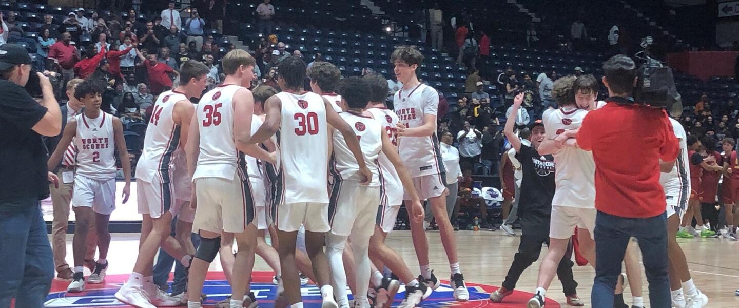The North Oconee boys celebrate after winning the Class 4A championship, the first in school history.