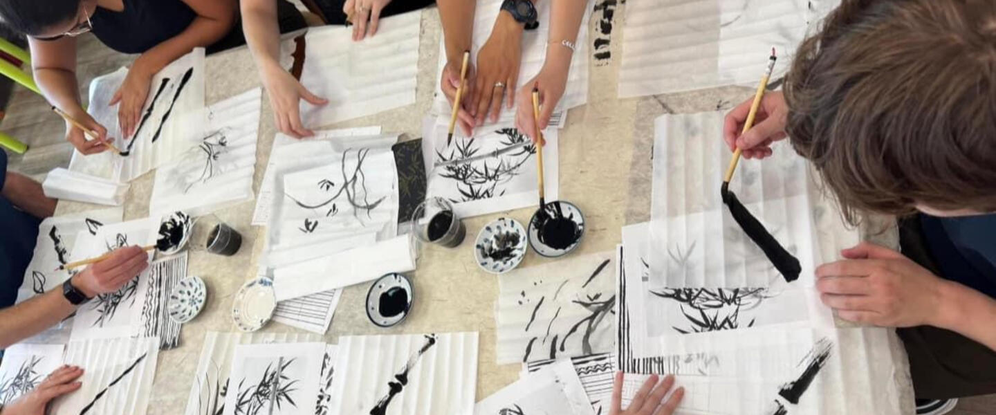 Calligraphy class inside Maomi Bookstore.