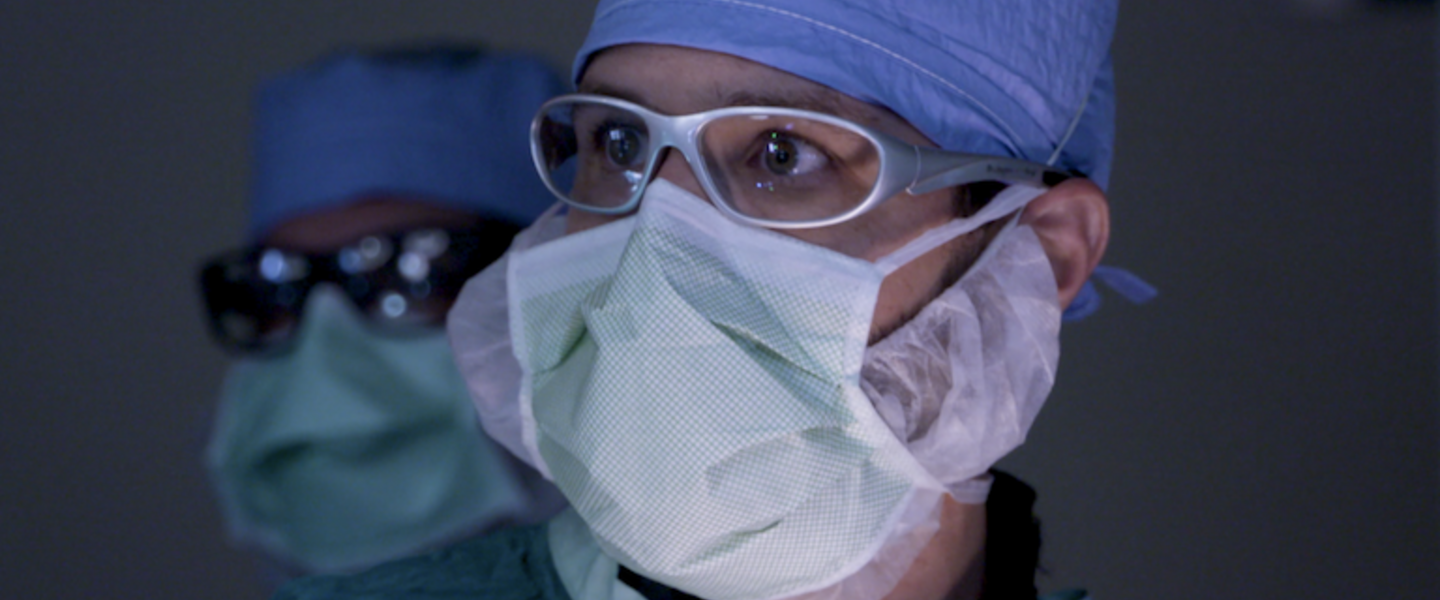 A masked surgeon.