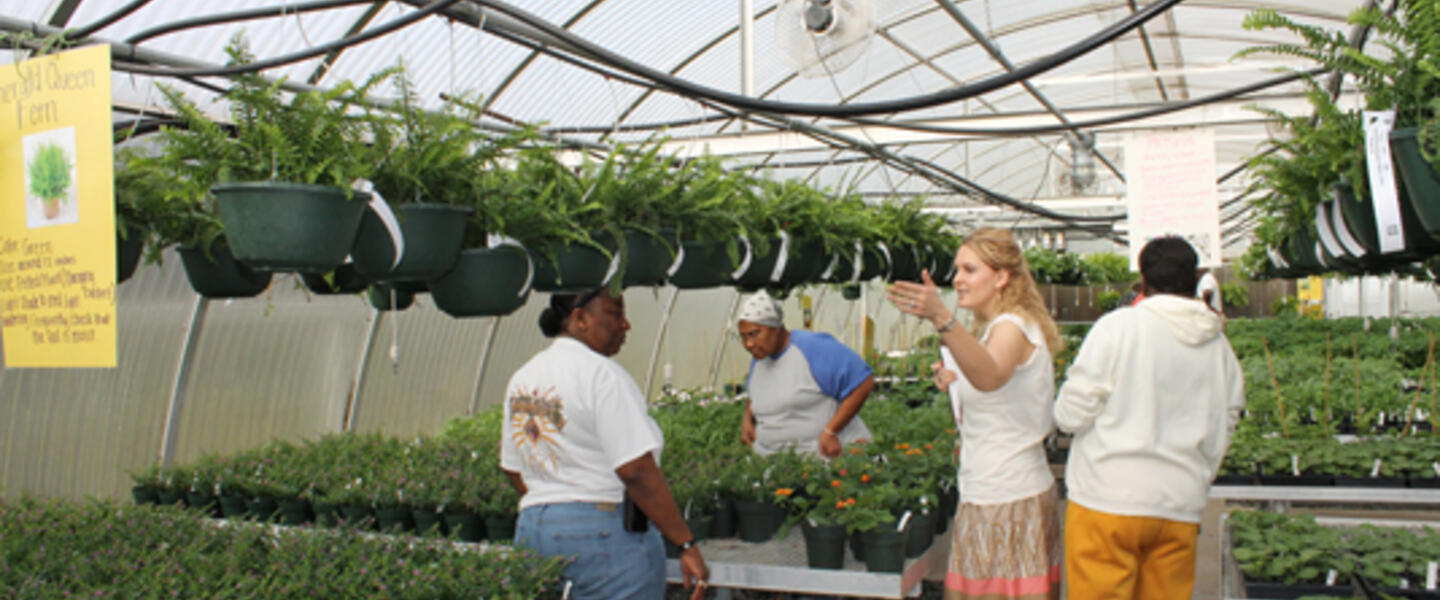 Colquitt County High School Teacher Adrienne Smith helps customers at a FFA Plant Sale. Photo: www.theblackandgold.org Colquitt County High School Teacher Adrienne Smith helps customers at a FFA Plant Sale. Photo: www.theblackandgold.org