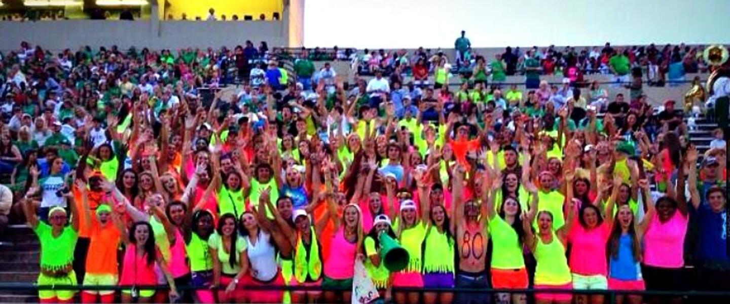 The Buford student section rocked bright neon get-ups as they cheered their Wolves onto a Week One victory against Elbert County The Buford student section rocked bright neon get-ups as they cheered their Wolves onto a Week One victory against Elbert County