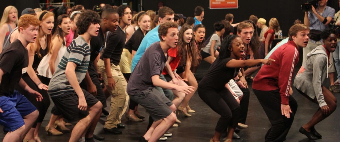 Students participate in a group rehearsal during their week in New York City. Students participate in a group rehearsal during their week in New York City.