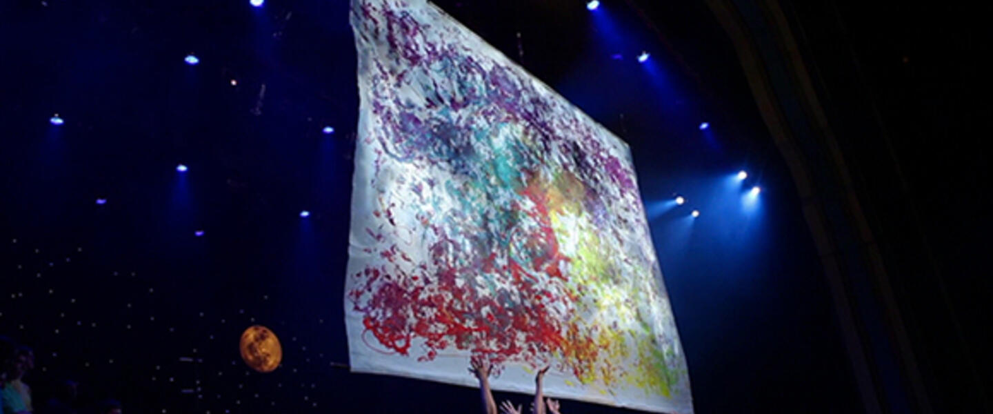 During the Live Art concert, students create artwork while onstate. During the Live Art concert, students create artwork while onstate.