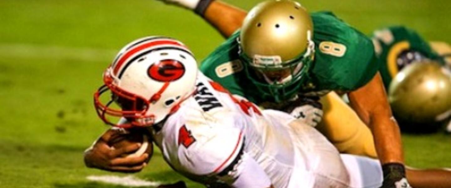 Gainesville Quarterback Deshaun Watson is taken down by a tackle on a carry. Gainesville Quarterback Deshaun Watson is taken down by a tackle on a carry.
