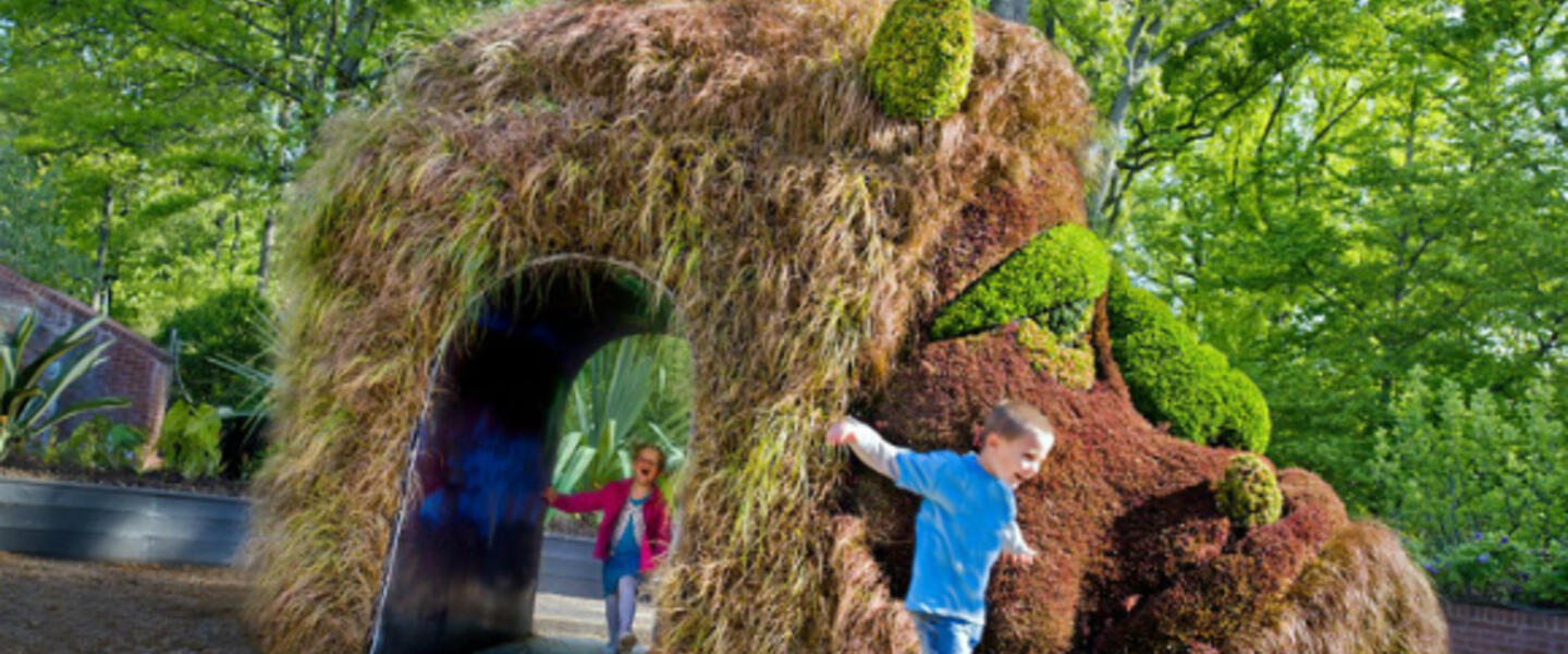 Kids can run through the giant ogre, one of the featured plant sculptures of Imaginary Worlds. Photo Atlanta Botanical Garden. Kids can run through the giant ogre, one of the featured plant sculptures of Imaginary Worlds. Photo Atlanta Botanical Garden.
