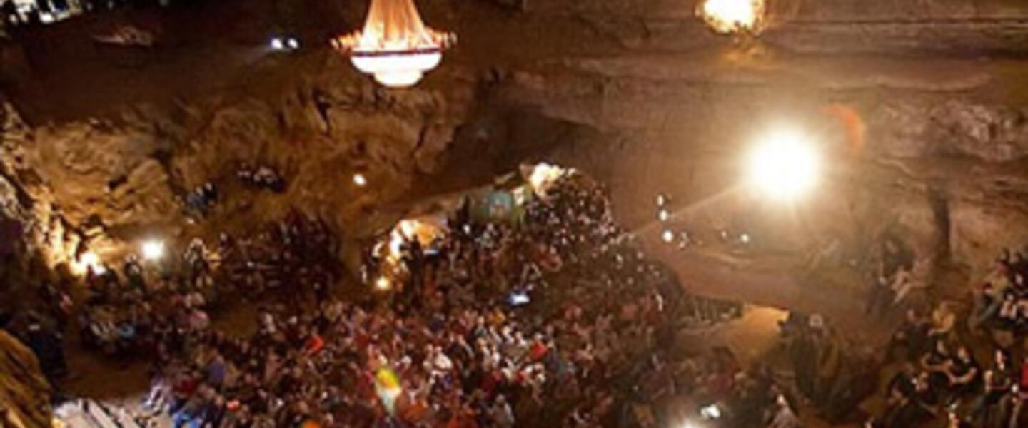 Crowd gathered for a concert inside a cave in Underground Bluegrass/ pbs.org/arts Crowd gathered for a concert inside a cave in Underground Bluegrass/ pbs.org/arts