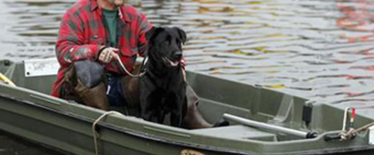 Ray Cilli and his dog Woubie are rescued from flood waters brought on by Hurricane Sandy in Little Ferry, New Jersey. Ray Cilli and his dog Woubie are rescued from flood waters brought on by Hurricane Sandy in Little Ferry, New Jersey.