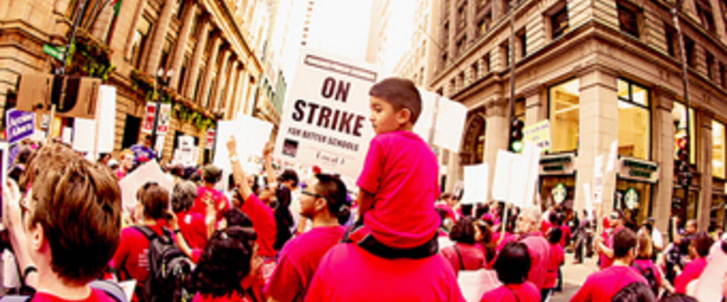 Chicago teachers rally during the walk out. Image courtesy flickr photostream kirstiecat. Chicago teachers rally during the walk out. Image courtesy flickr photostream kirstiecat.