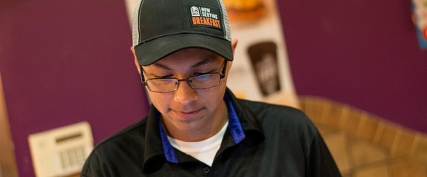 A teen worker. (Photo Courtesy of <a href=https://www.flickr.com/photos/killy/13504267485/>Adolfo Chavez III via Flickr</a>.)