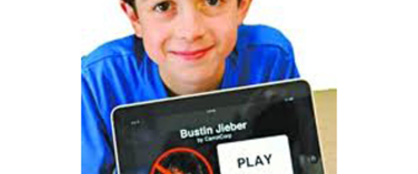 Thomas Suarez created the Bustin Jieber app for iPhones and iPads to learn how to develop apps. Photo from ixwebhosting.mobi. Thomas Suarez created the Bustin Jieber app for iPhones and iPads to learn how to develop apps. Photo from ixwebhosting.mobi.