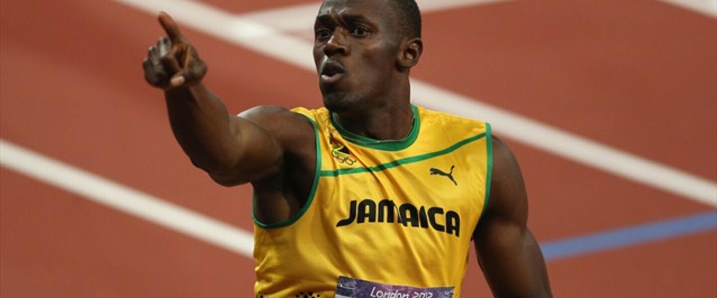 Usain Bolt's 6'5 height and lean muscle mass contribute to his Olympic victory. (Photo courtesy http://www.london2012.com) Usain Bolt's 6'5 height and lean muscle mass contribute to his Olympic victory. (Photo courtesy http://www.london2012.com)