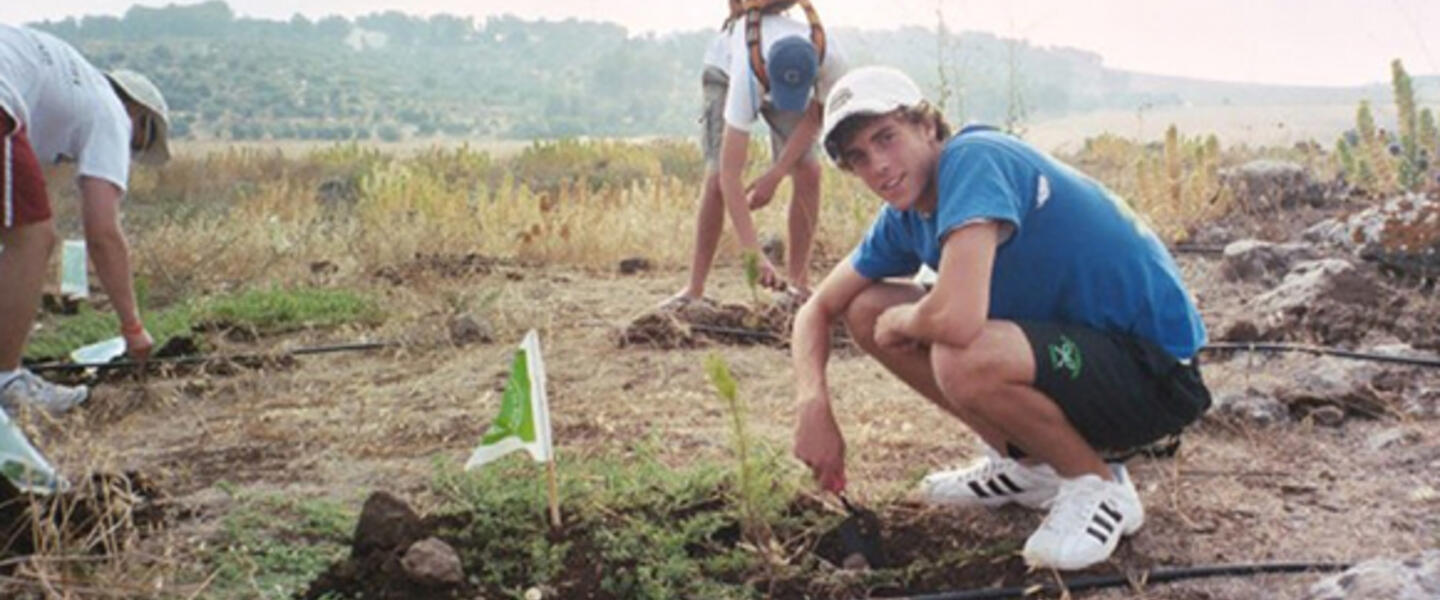 Jeremy Katz plants a tree in Israel in 2005. Photo courtesy Jeremy Katz Jeremy Katz plants a tree in Israel in 2005. Photo courtesy Jeremy Katz