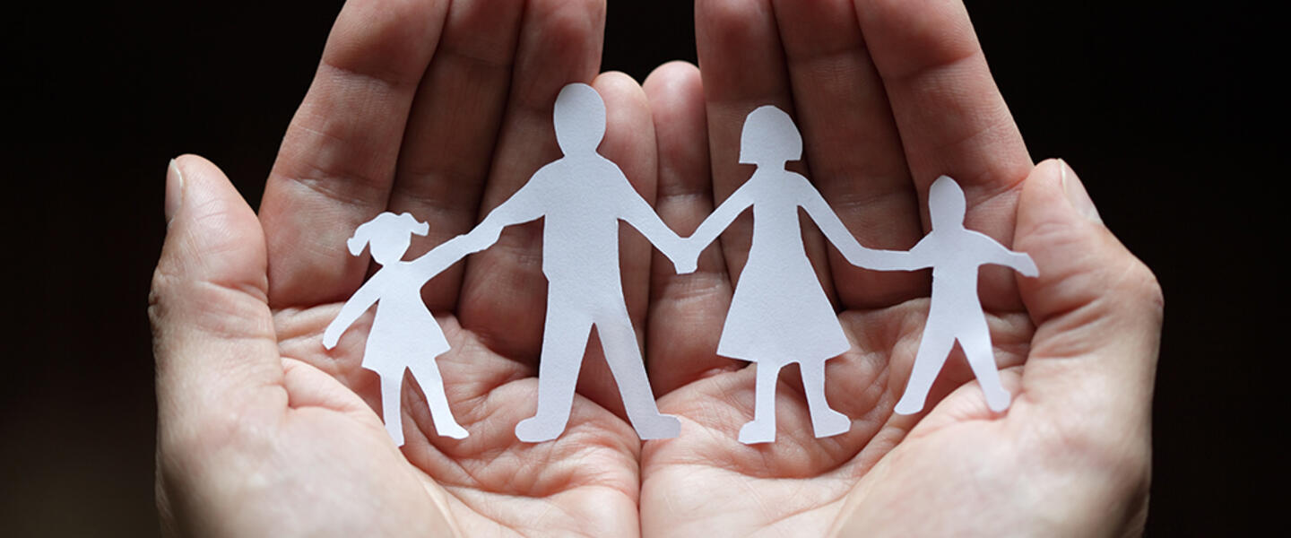 a family of paper cutouts