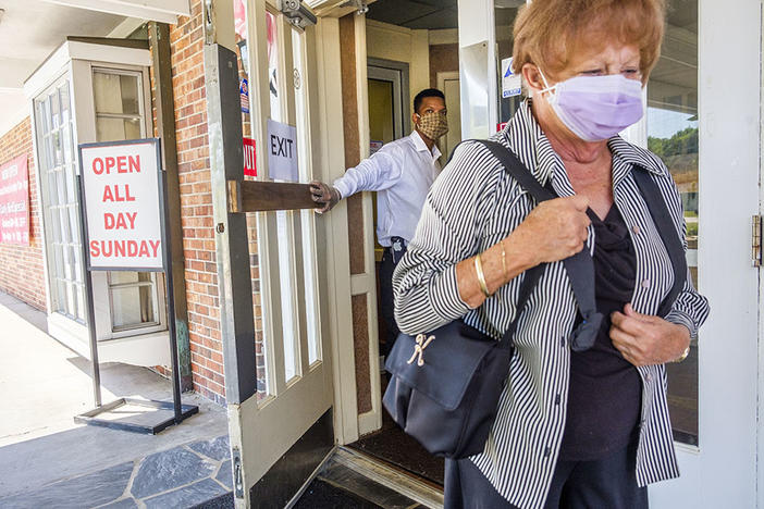 A masked diner leaves the S&S Restaurant on Riverside Drive in Macon in May. Macon-Bibb County has mandated mask use in all local businesses and government offices. 