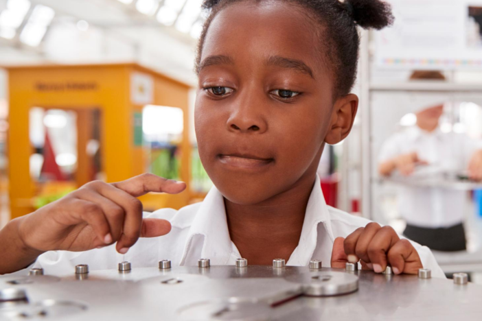 Girl learning science 