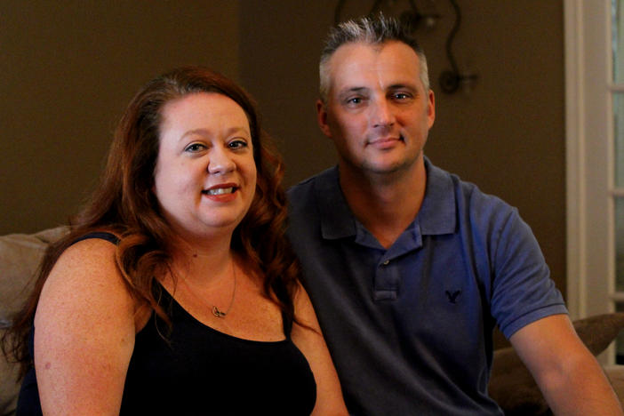 Stephanie and Shane Osterhout in their living room.