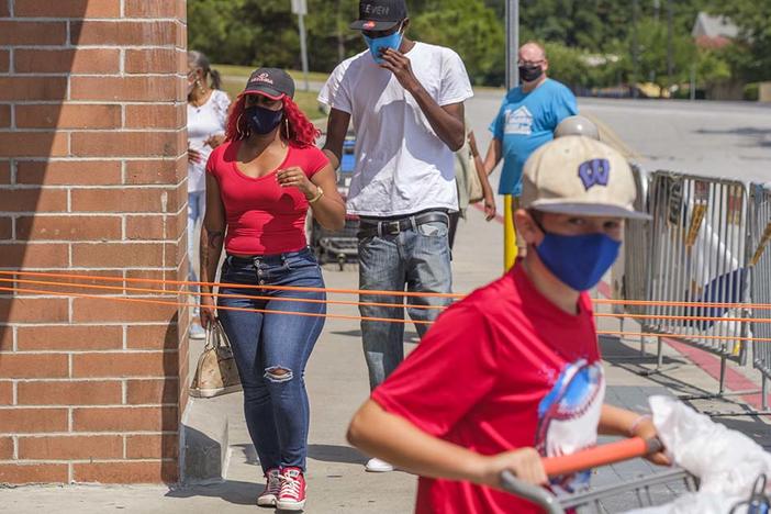 Shoppers at the Walmart store on Zebulon Road in Macon recently. 