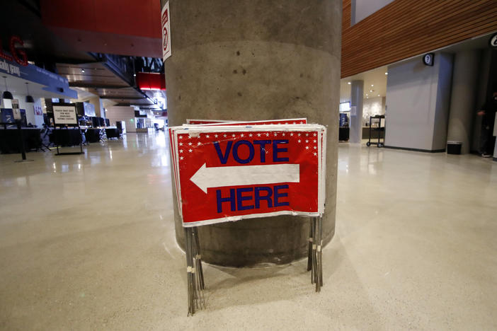Election signs are stored at State Farm Arena, home of the NBA's Atlanta Hawks basketball team, Friday, July 17, 2020, in Atlanta. The 16,888-seat facility will be used as a poll location for the upcoming election.